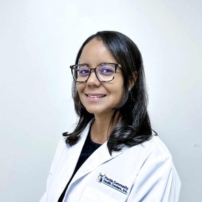Headshot of Anelkis Vieira, APRN, smiling in a white FCHC lab coat.